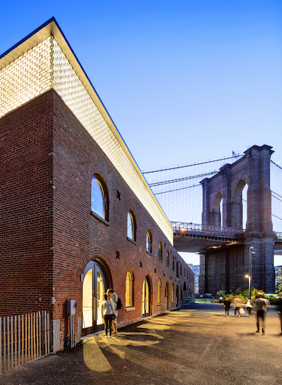 Entrance from the park and view of the
                        Brooklyn Bridge